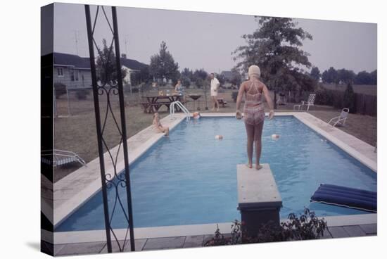 1959: Susan in Diving Stance During a Family Cookout, Trenton, New Jersey-Frank Scherschel-Stretched Canvas