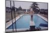 1959: Susan in Diving Stance During a Family Cookout, Trenton, New Jersey-Frank Scherschel-Mounted Photographic Print