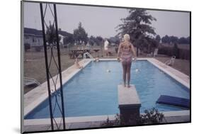 1959: Susan in Diving Stance During a Family Cookout, Trenton, New Jersey-Frank Scherschel-Mounted Photographic Print