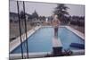 1959: Susan in Diving Stance During a Family Cookout, Trenton, New Jersey-Frank Scherschel-Mounted Photographic Print