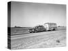 1960s-1970s Family Station Wagon and Camping Trailer Driving on Country Highway on Vacation-null-Stretched Canvas