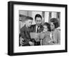 1960s FAMILY MOTHER FATHER SON DAUGHTER SITTING TOGETHER READING BIBLE INDOOR-Panoramic Images-Framed Photographic Print