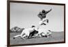 1960s FOOTBALL PLAYER JUMPING OVER BLOCKED PLAYERS-H. Armstrong Roberts-Framed Photographic Print