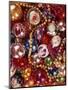 1960s OVERALL PATTERN OF PILE OF CHRISTMAS TREE DECORATIONS GLASS BALLS STRANDS OF BEADS COLORFUL-Panoramic Images-Mounted Photographic Print