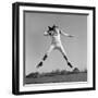 1960s QUARTERBACK JUMPING AND THROWING PASS FOOTBALL-H. Armstrong Roberts-Framed Photographic Print