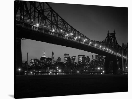 1960s Queensboro Bridge and Manhattan Skyline at Night New York City-null-Stretched Canvas