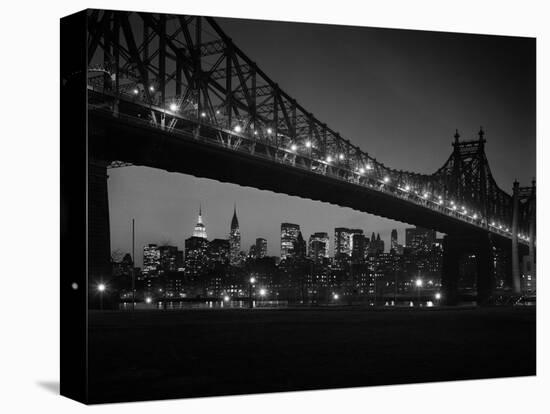 1960s Queensboro Bridge and Manhattan Skyline at Night New York City-null-Stretched Canvas