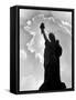 1960s Silhouette of Statue of Liberty with Sun Ray Clouds Behind-null-Framed Stretched Canvas