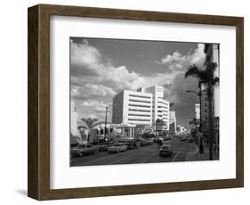 1960s STREET SCENE WILSHIRE BOULEVARD AND RODEO DRIVE LOS ANGELES CA USA-Panoramic Images-Framed Photographic Print