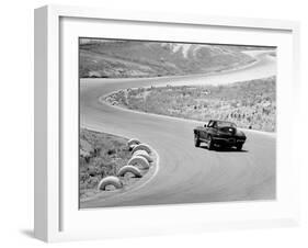 1964 Chevrolet Corvette Stingray on a Winding Racetrack, (C1964)-null-Framed Photographic Print