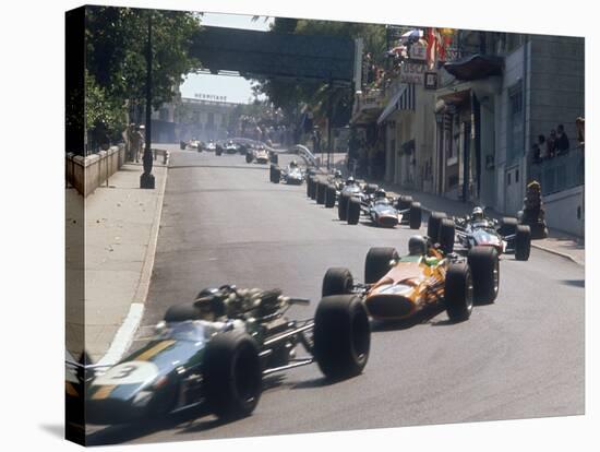 1968 Monaco Grand Prix, Jochen Rindt in Brabham leads Bruce McLaren in McLaren-Ford-null-Stretched Canvas