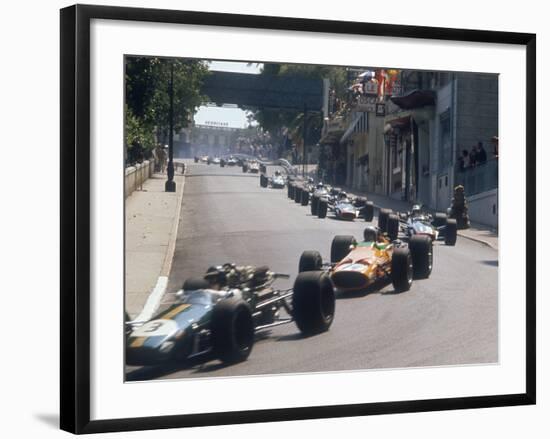 1968 Monaco Grand Prix, Jochen Rindt in Brabham leads Bruce McLaren in McLaren-Ford-null-Framed Photographic Print