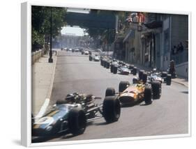 1968 Monaco Grand Prix, Jochen Rindt in Brabham leads Bruce McLaren in McLaren-Ford-null-Framed Photographic Print