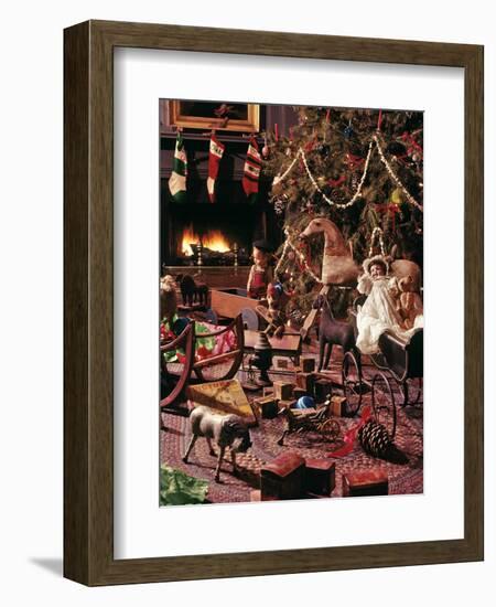 1970s 1980s OLD FASHIONED DECORATED CHRISTMAS TREE WITH POPCORN GARLANDS BY FIREPLACE ANTIQUE TOYS-Panoramic Images-Framed Photographic Print