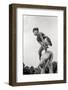1970s TWO BOYS PLAYING LEAPFROG ONE VAULTING OVER THE OTHER-H. Armstrong Roberts-Framed Photographic Print