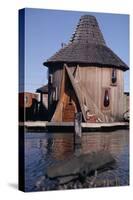 1971: Floating-Home Owner Mary Holt Sunbathes on the Deck of Her House, Sausalito, California-Michael Rougier-Stretched Canvas