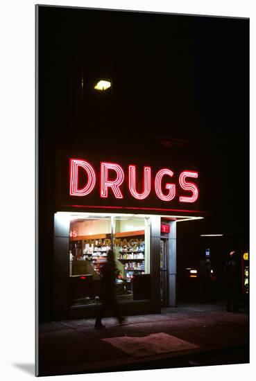 1980s Drug Store at Night Pink Neon Sign-null-Mounted Photographic Print