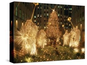 1980s ROCKEFELLER CENTER LIGHTED ANGELS AND CHRISTMAS TREE NEW YORK CITY NEW YORK USA-Panoramic Images-Stretched Canvas