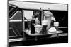 1990s FOOD TRAY WITH SODA FOUNTAIN ITEMS ON CAR WINDOW AT 1950s STYLE DRIVE-IN RESTAURANT-Hub Willson-Mounted Premium Photographic Print