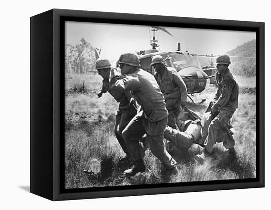 1st Cavalry Division-Peter Arnett-Framed Stretched Canvas