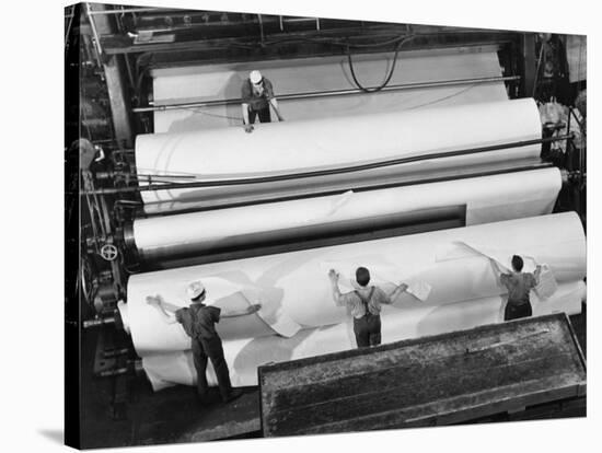 20 Ft. Roll of Finished Paper Arriving on the Rewinder, Ready to Be Cut and Shipped from Paper Mill-Margaret Bourke-White-Stretched Canvas