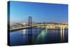 25th of April Bridge over the Tagus river (Tejo river) and Lisbon at twilight. Portugal-Mauricio Abreu-Stretched Canvas