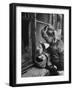 3 Year Old Child Playing with Doll on Window Sill of Apartment-Stan Wayman-Framed Photographic Print