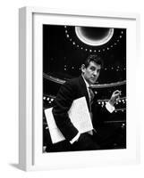 36 Year Old Composer Leonard Bernstein, Holding Musical Score with Lighted Auditorium Behind Him-Gordon Parks-Framed Premium Photographic Print