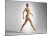3D Rendering of a Naked Woman Walking, with Skeletal Bones Superimposed-null-Mounted Art Print