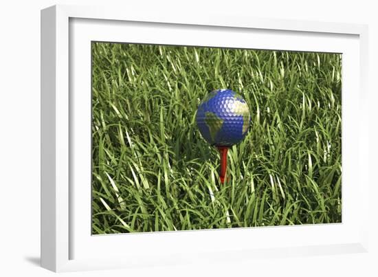 3D Rendering of an Earth Golf Ball on Tee in the Grass-null-Framed Art Print