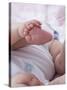 4 Month Old Baby Girl Holding Her Foot-Amanda Hall-Stretched Canvas