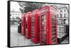 4 red telephone boxes, London, England, UK-Jon Arnold-Framed Stretched Canvas