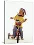 4 Year Old Boy Posing on His Tricycle, New York, New York, USA-Paul Sutton-Stretched Canvas