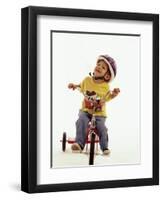 4 Year Old Boy Posing on His Tricycle, New York, New York, USA-Paul Sutton-Framed Premium Photographic Print