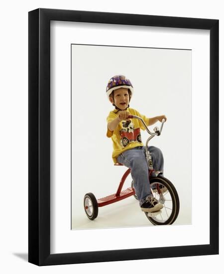 4 Year Old Boy Posing on His Tricycle, New York, New York, USA-Paul Sutton-Framed Premium Photographic Print