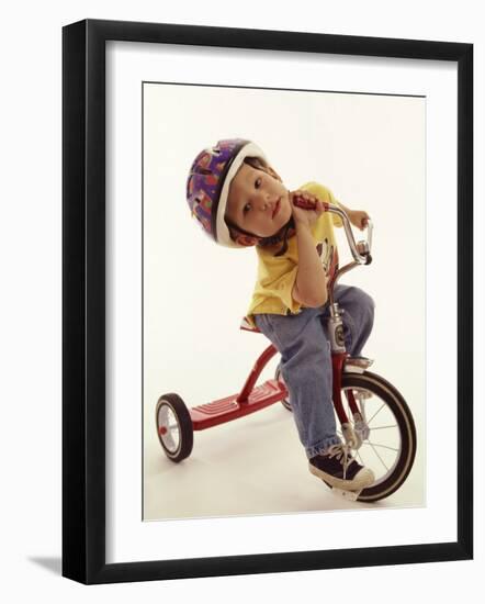 4 Year Old Boy Posing on His Tricycle, New York, New York, USA-Paul Sutton-Framed Photographic Print