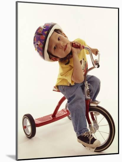 4 Year Old Boy Posing on His Tricycle, New York, New York, USA-Paul Sutton-Mounted Photographic Print