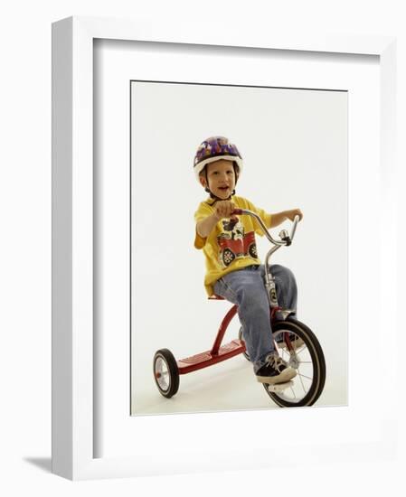 4 Year Old Boy Posing on His Tricycle, New York, New York, USA-Paul Sutton-Framed Photographic Print