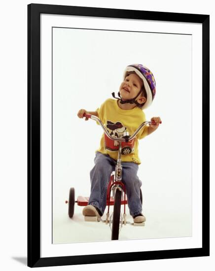 4 Year Old Boy Posing on His Tricycle, New York, New York, USA-Paul Sutton-Framed Photographic Print