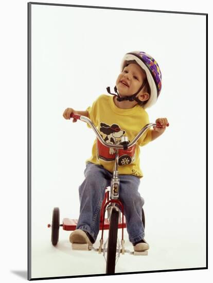 4 Year Old Boy Posing on His Tricycle, New York, New York, USA-Paul Sutton-Mounted Photographic Print