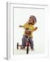 4 Year Old Boy Posing on His Tricycle, New York, New York, USA-Paul Sutton-Framed Photographic Print