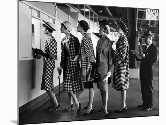 5 Models Wearing Fashionable Dress Suits at a Race Track Betting Window, at Roosevelt Raceway-Nina Leen-Mounted Photographic Print