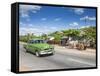 50s American Car Passing Ox and Cart, Pinar Del Rio Province, Cuba-Jon Arnold-Framed Stretched Canvas