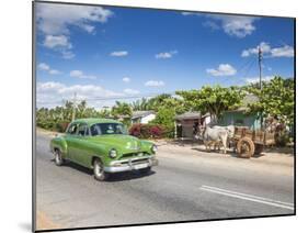 50s American Car Passing Ox and Cart, Pinar Del Rio Province, Cuba-Jon Arnold-Mounted Photographic Print