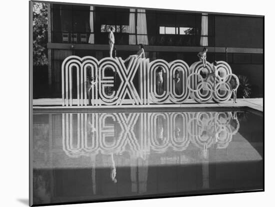 6 Foot Sign Will Stand Outside Each Arena and Stadium of 1968 Olympics, to Be Held in Mexico City-John Dominis-Mounted Photographic Print
