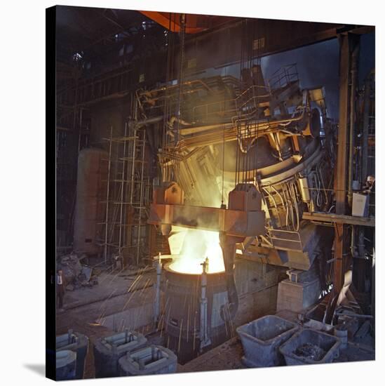 75 Ton Arc Furnace Pouring Molten Steel into a Vessel, Sheffield, South Yorkshire, 1969-Michael Walters-Stretched Canvas