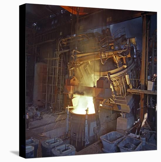 75 Ton Arc Furnace Pouring Molten Steel into a Vessel, Sheffield, South Yorkshire, 1969-Michael Walters-Stretched Canvas