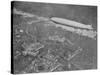 750 Foot Long Graf Zeppelin LZ 127 Flying Above British Capital-null-Stretched Canvas