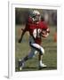 8 Year Old Boy Running with the Football-null-Framed Photographic Print