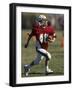 8 Year Old Boy Running with the Football-null-Framed Photographic Print